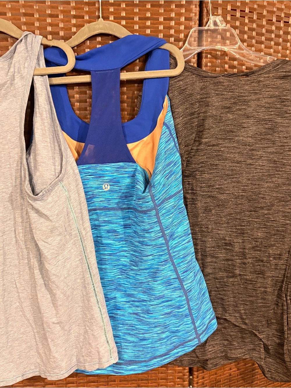 Lot of 3 Lululemon tank tops small and one medium workout yoga running